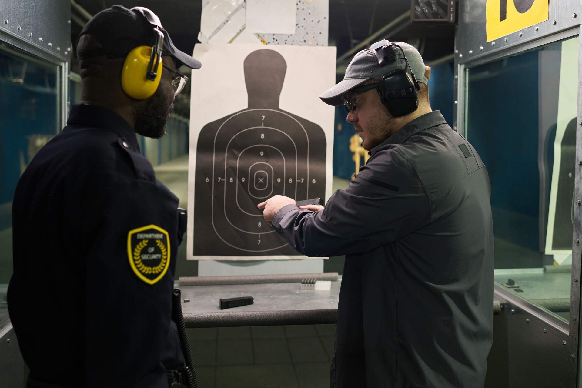 Training at Shooting Range with Law Enforcement Officer
