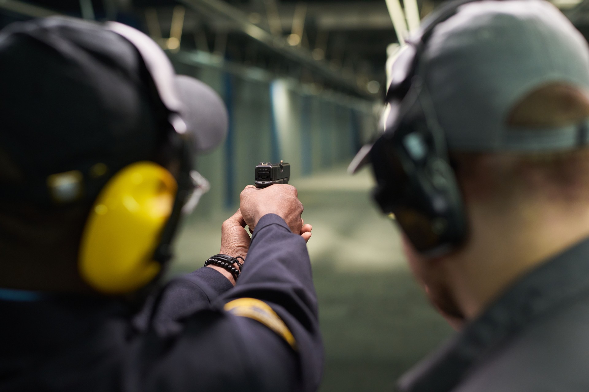 African American Man Practicing Shooting at Shooting Range