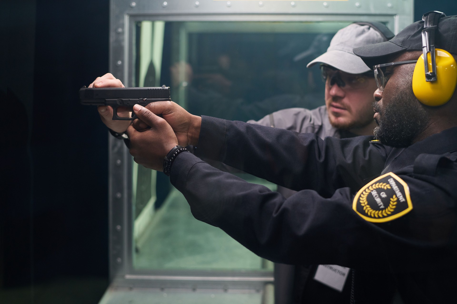 Instructing at Indoor Shooting Range with Safety Gear